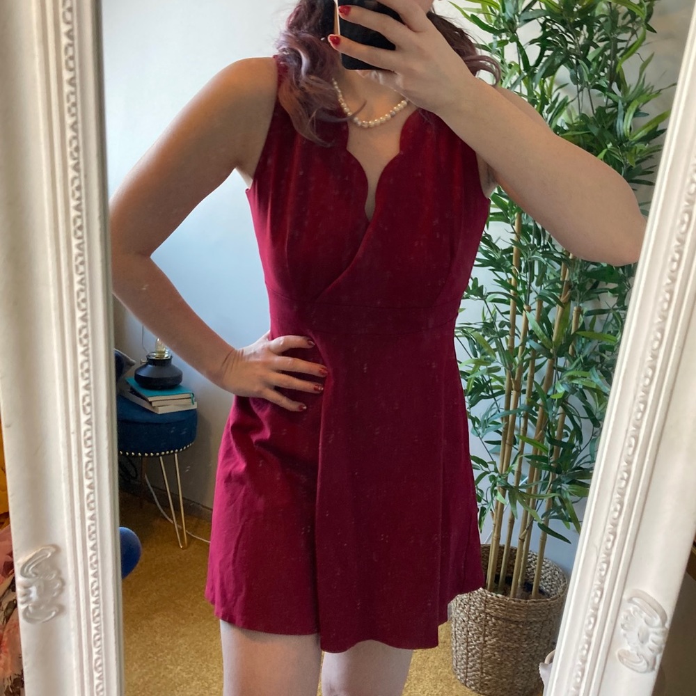 Red Mini Dress with scalloped neckline detail.